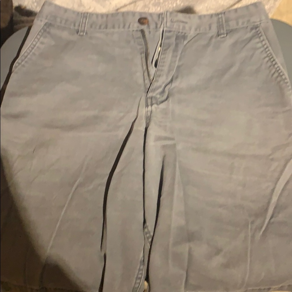 Grey shorts.